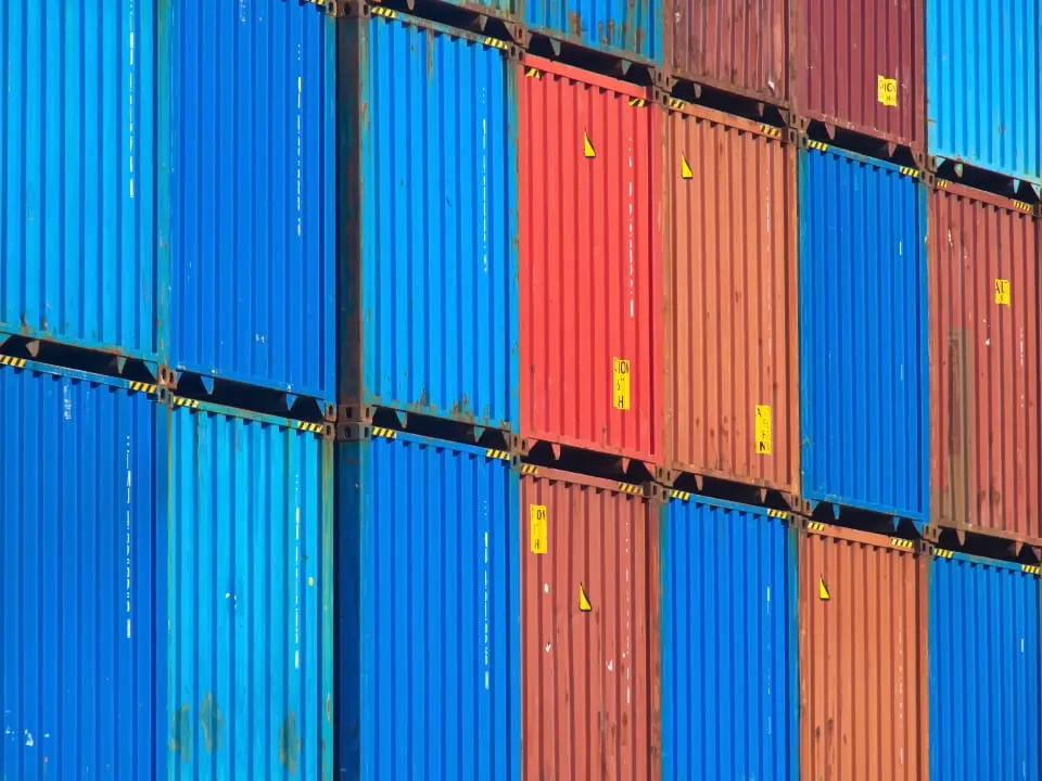 Stacked shipping containers at a port