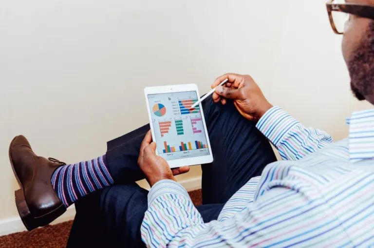 Person reviewing a chart on a tablet